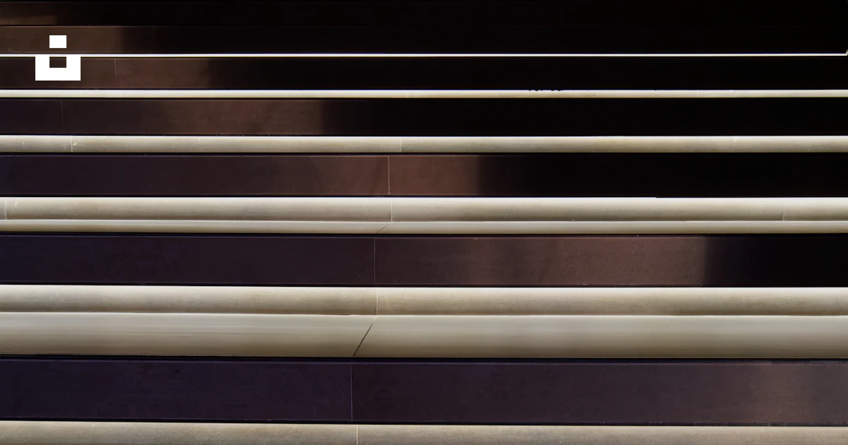 Linear Railing Texture A close up of a metal railing with a black background photo – Free ...