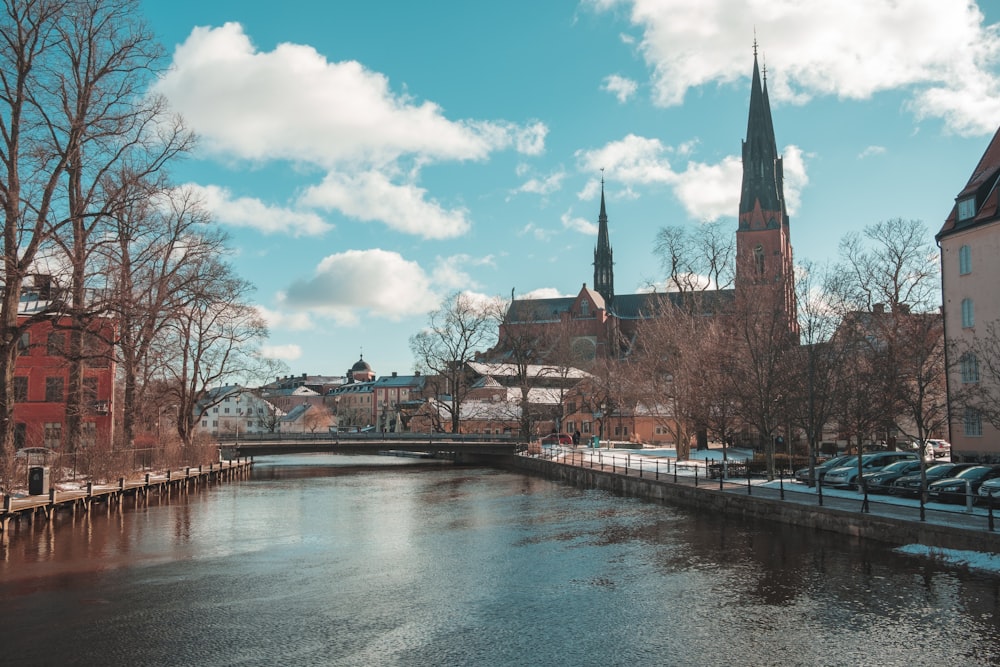 view of body of water between buildings