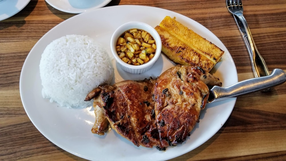 plate of grilled meat, grilled fruit, and steamed rice