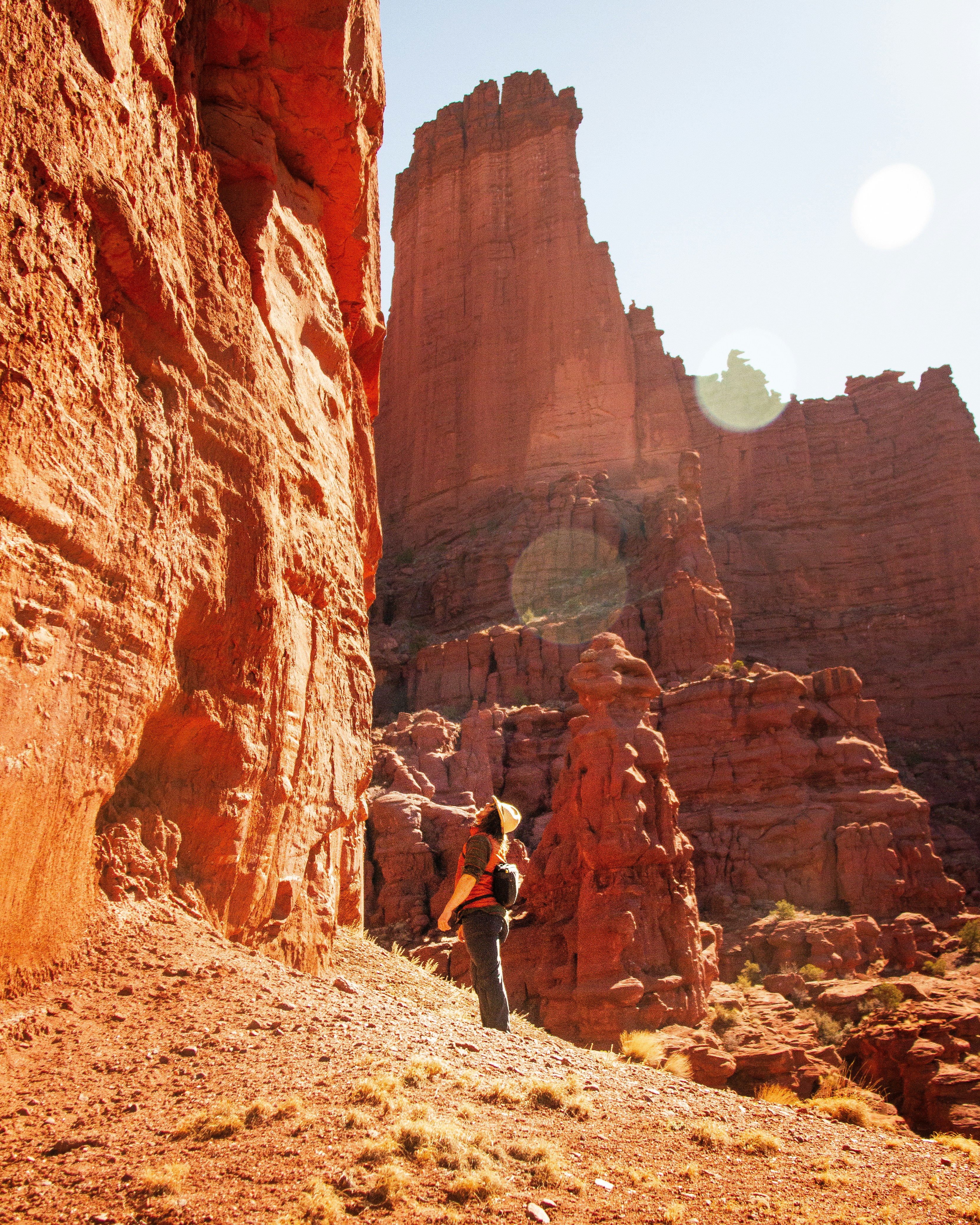 person standing near rock formation
