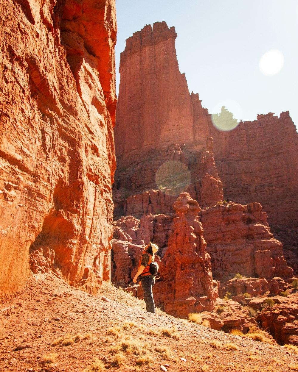 person standing near rock formation