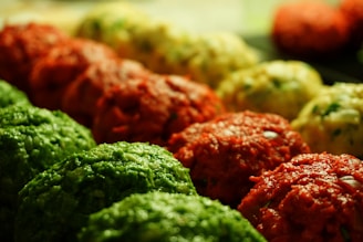 A close-up of colorful handball and rugby balls arranged aesthetically.