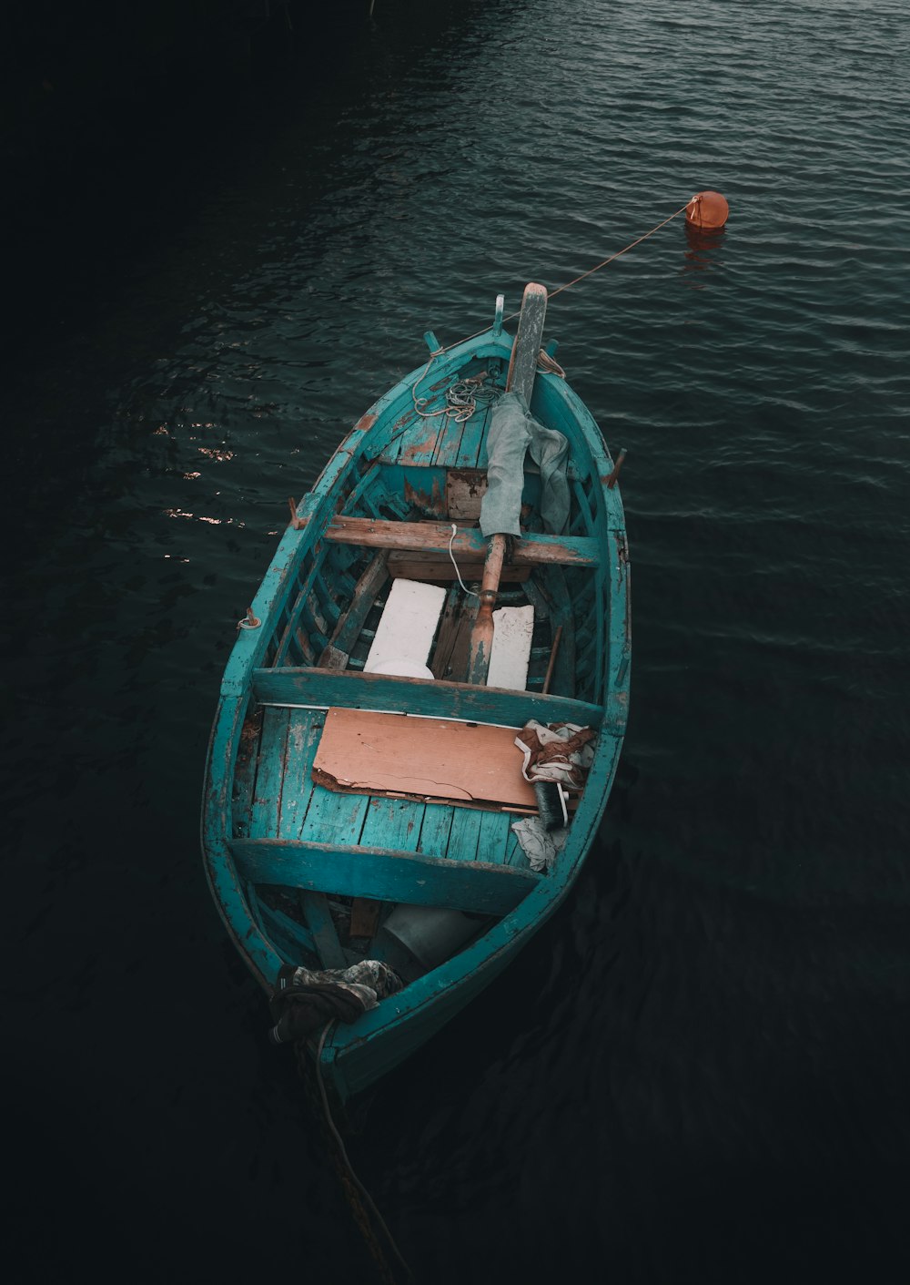 teal wooden boat