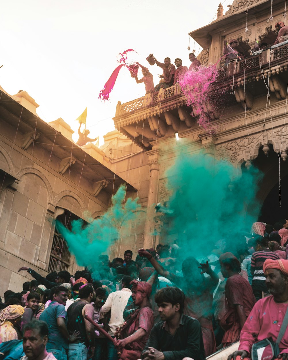 group of people gathering near building structure