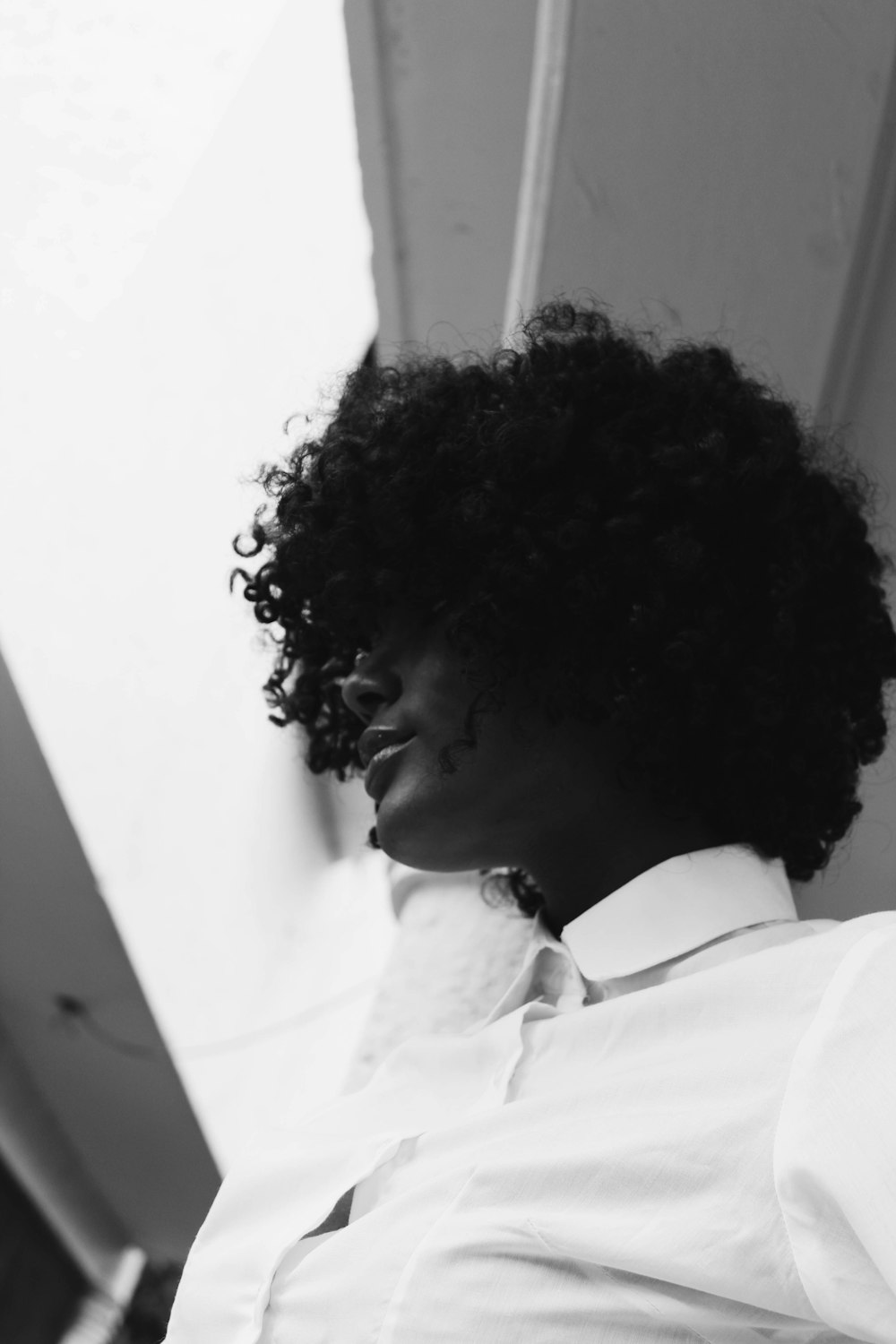 mannequin wearing white collared shirt