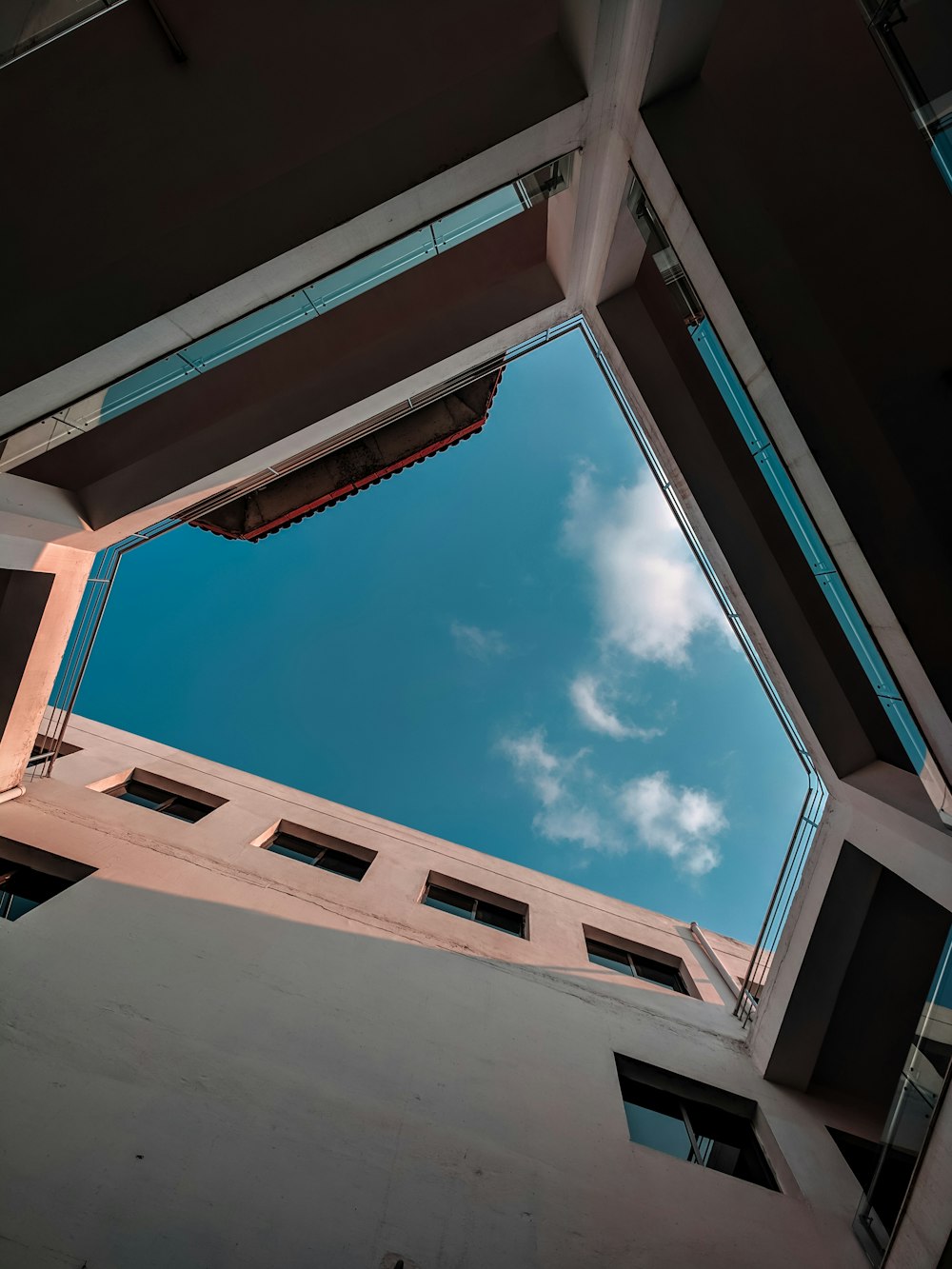 bottom view of concrete building during daytime