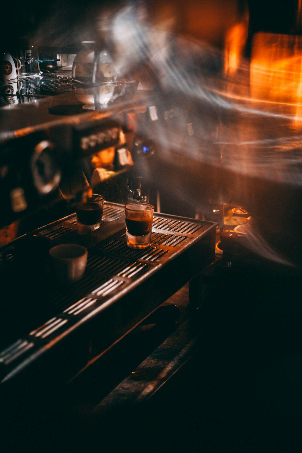 a coffee machine with steam coming out of it