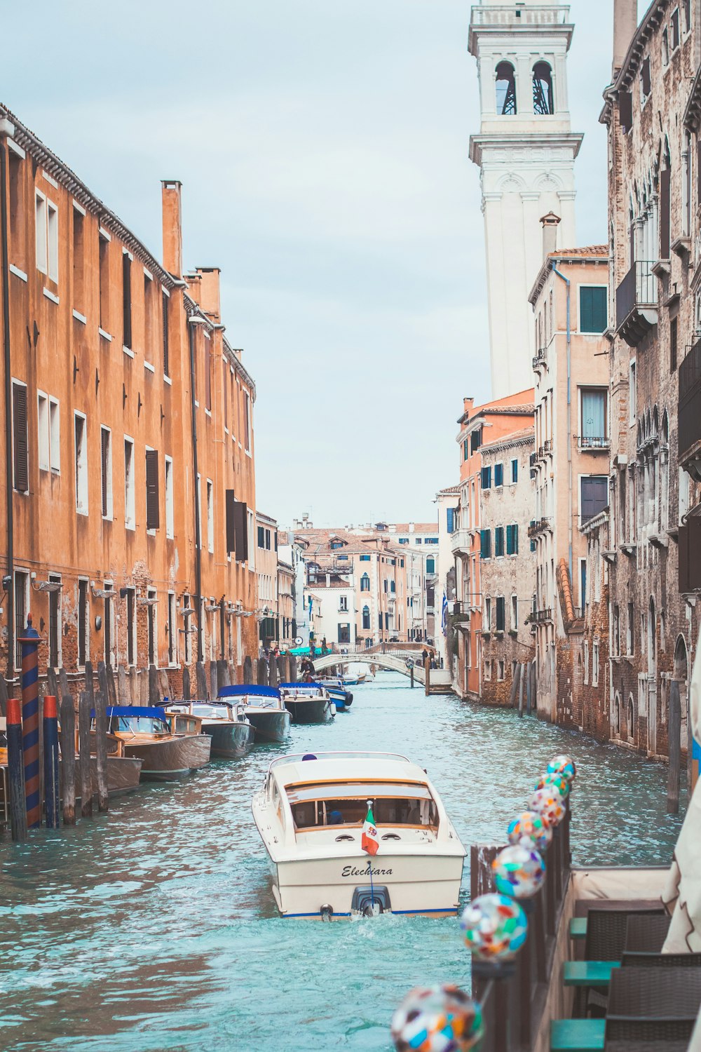 boat on body of water near building structures