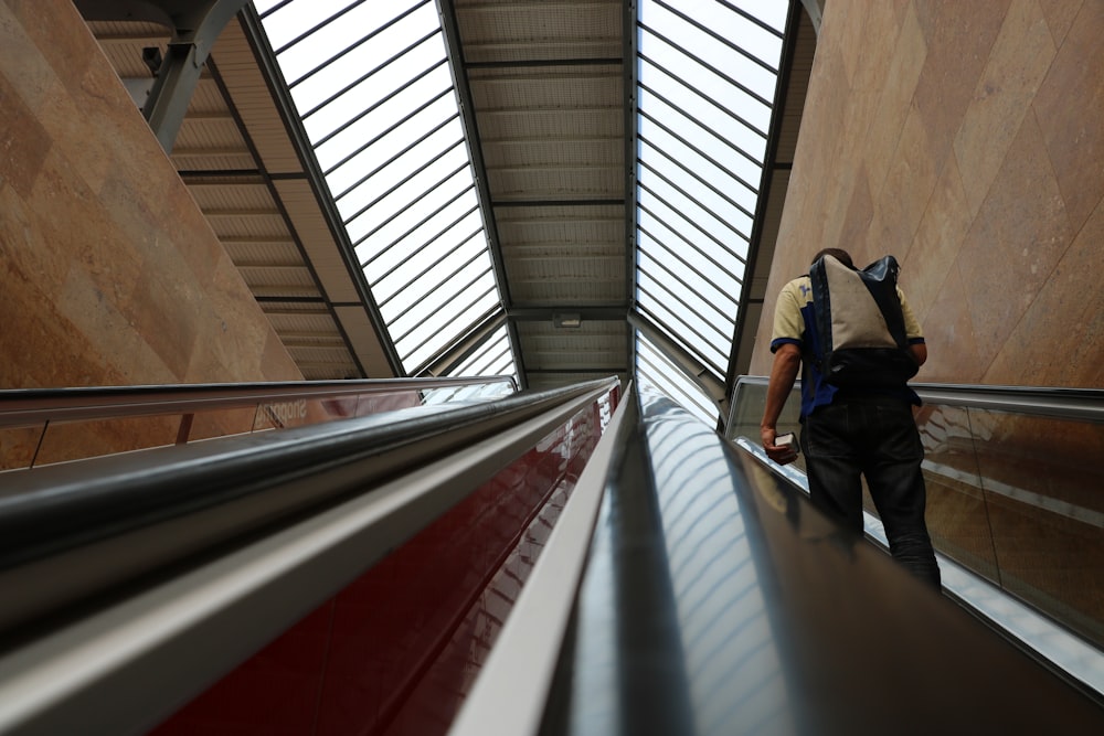 person on stairs inside building