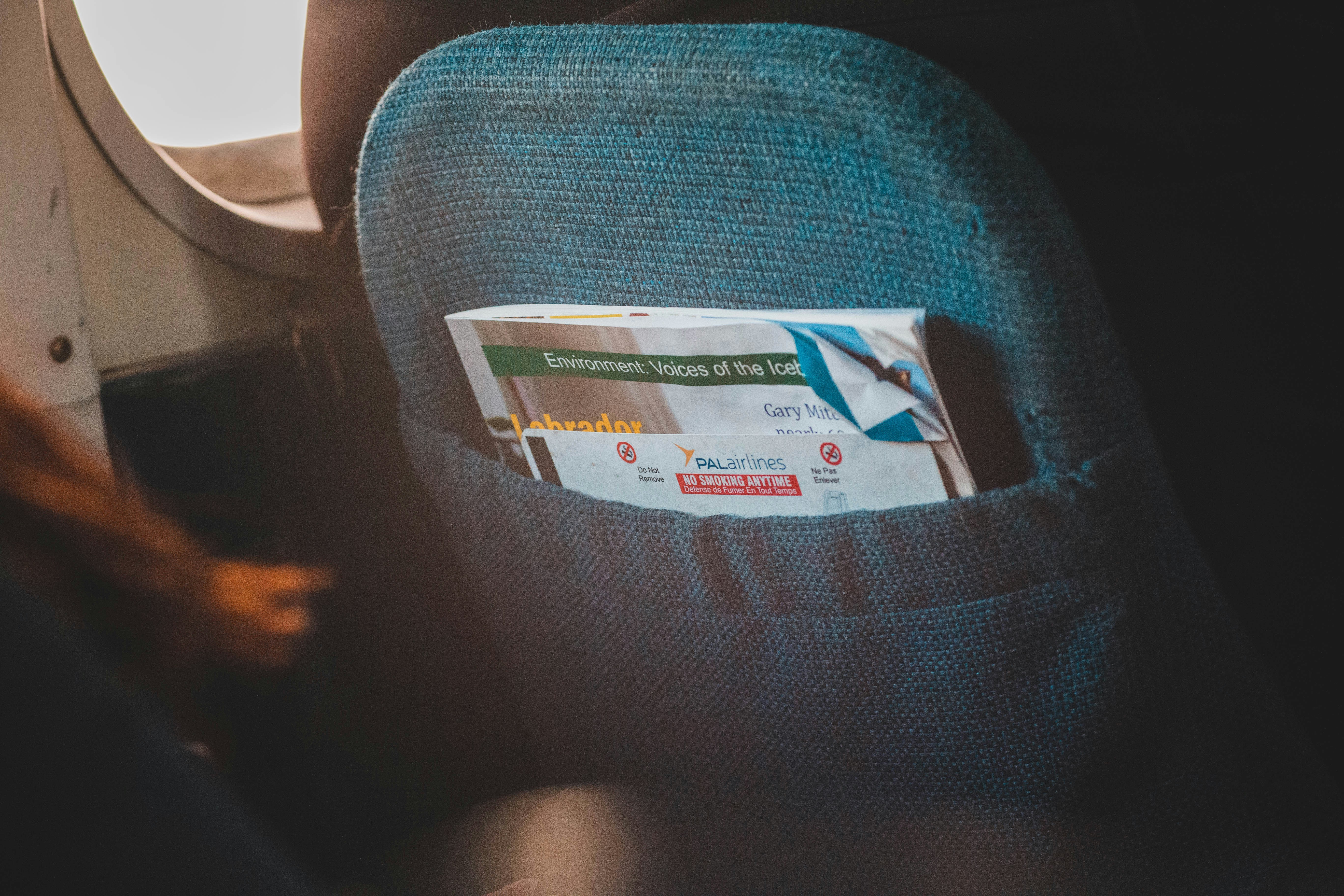 white magazine on chair, 