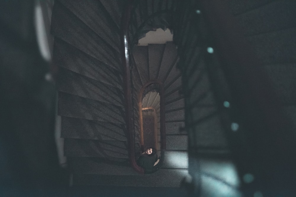 man on spiral staircase