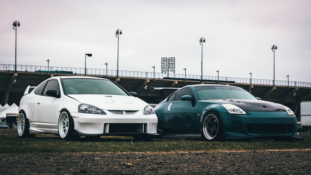 two black and white coupes