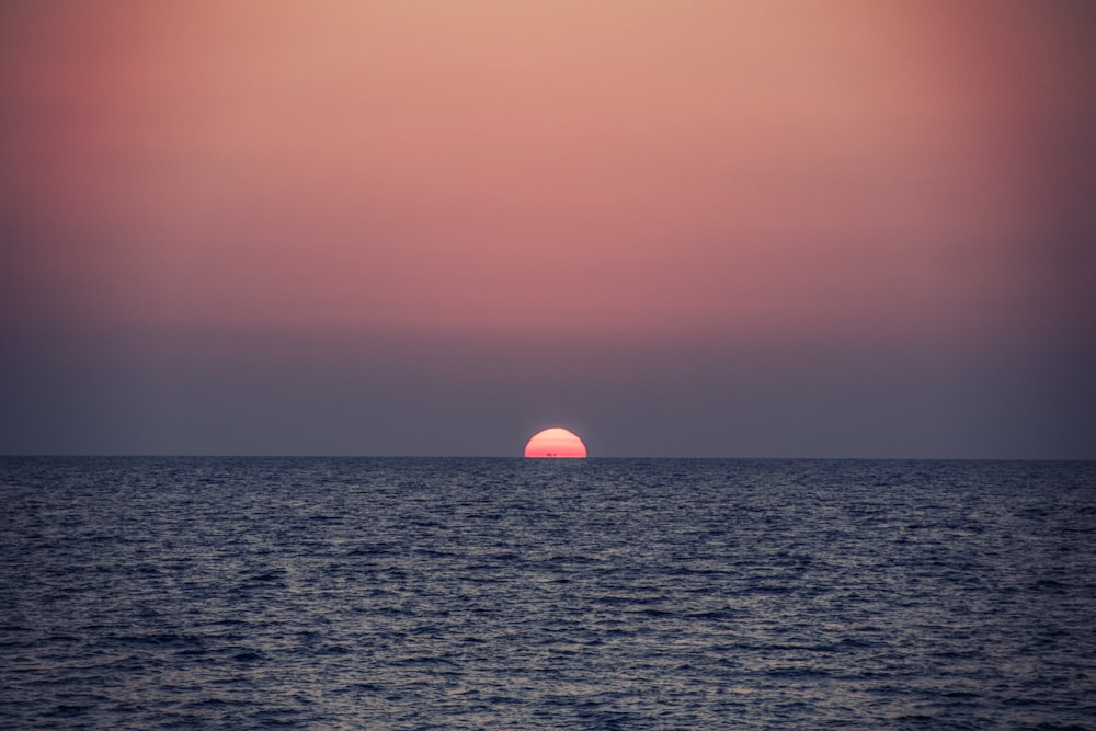 calm sea during sunset