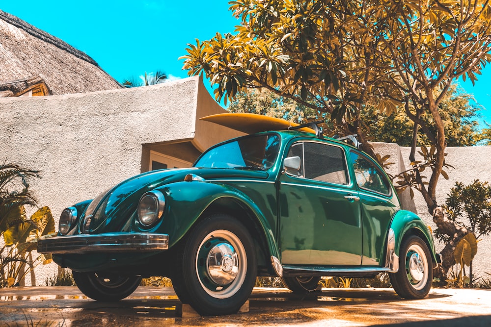 parked blue Volkswagen coupe