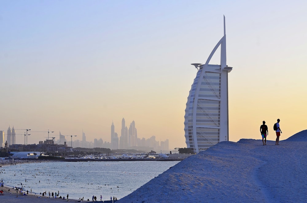 two person standing near Burj Khalifa