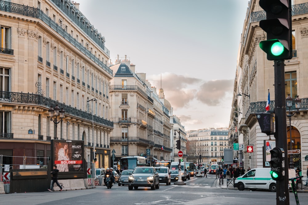 cars on road near buildings