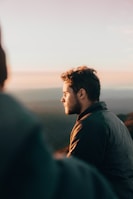 man wearing black jacket during daytime