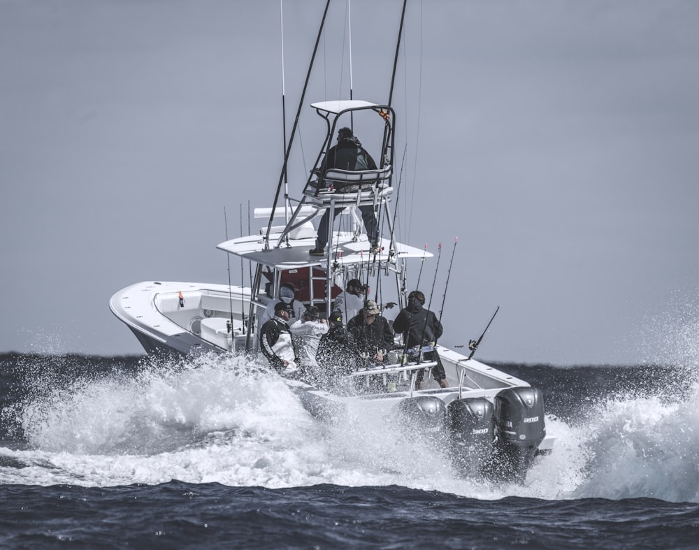 people riding on boat during daytime