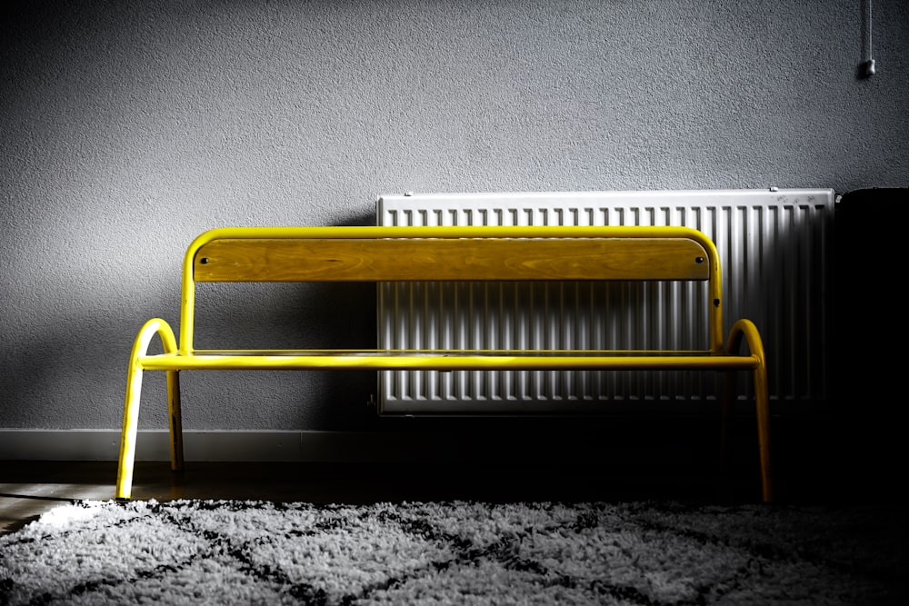 shallow focus photo of yellow steel couch