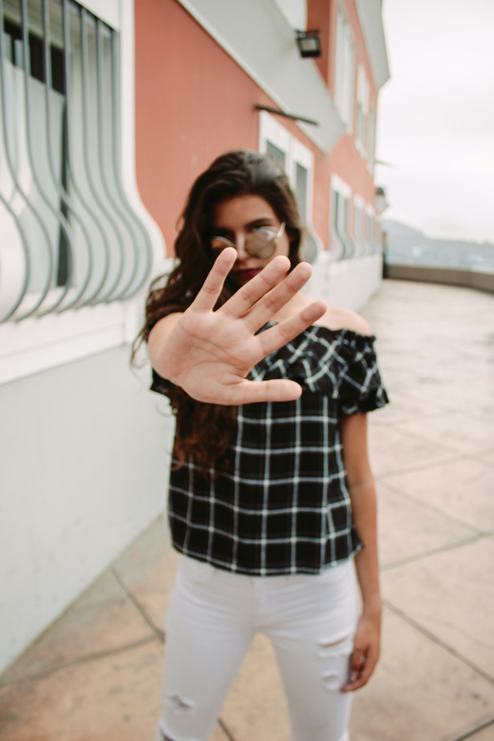 woman wearing black top showing palm