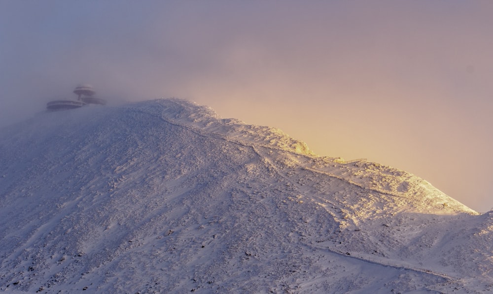 snow field hill during daytime