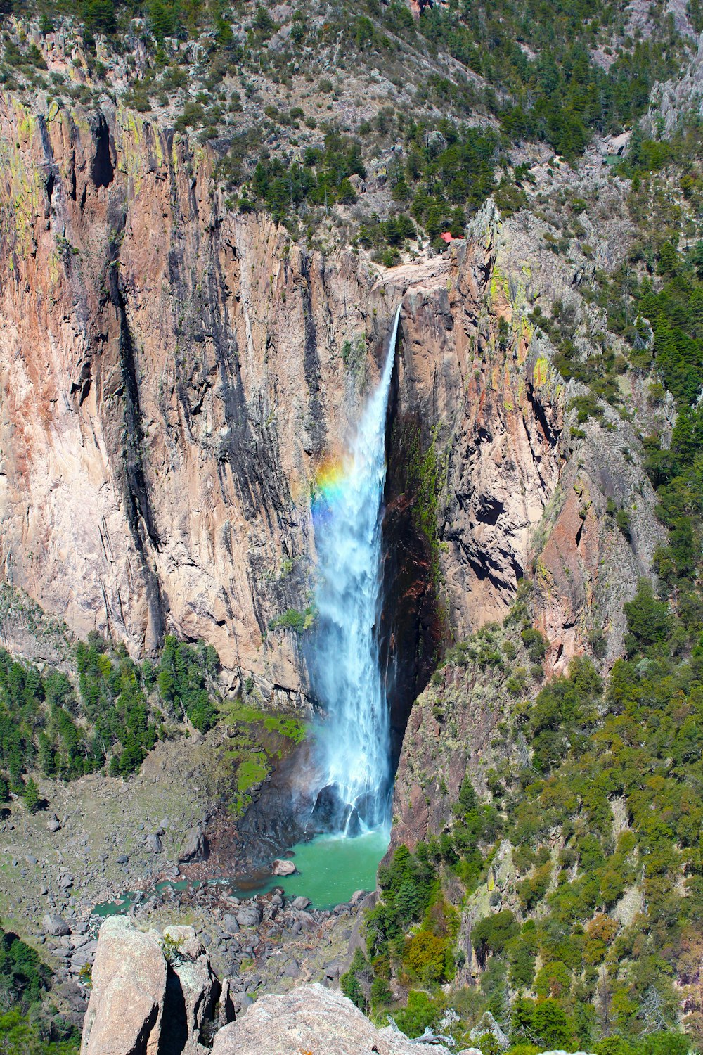 aerial photography of gray rock mountain and waterfalls