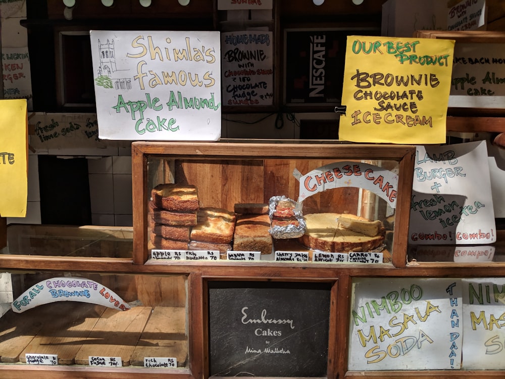 a display case filled with lots of different types of pastries