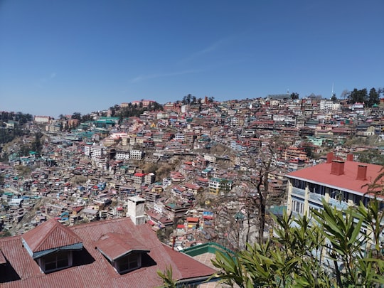 houses under the blue sky in Shimla India