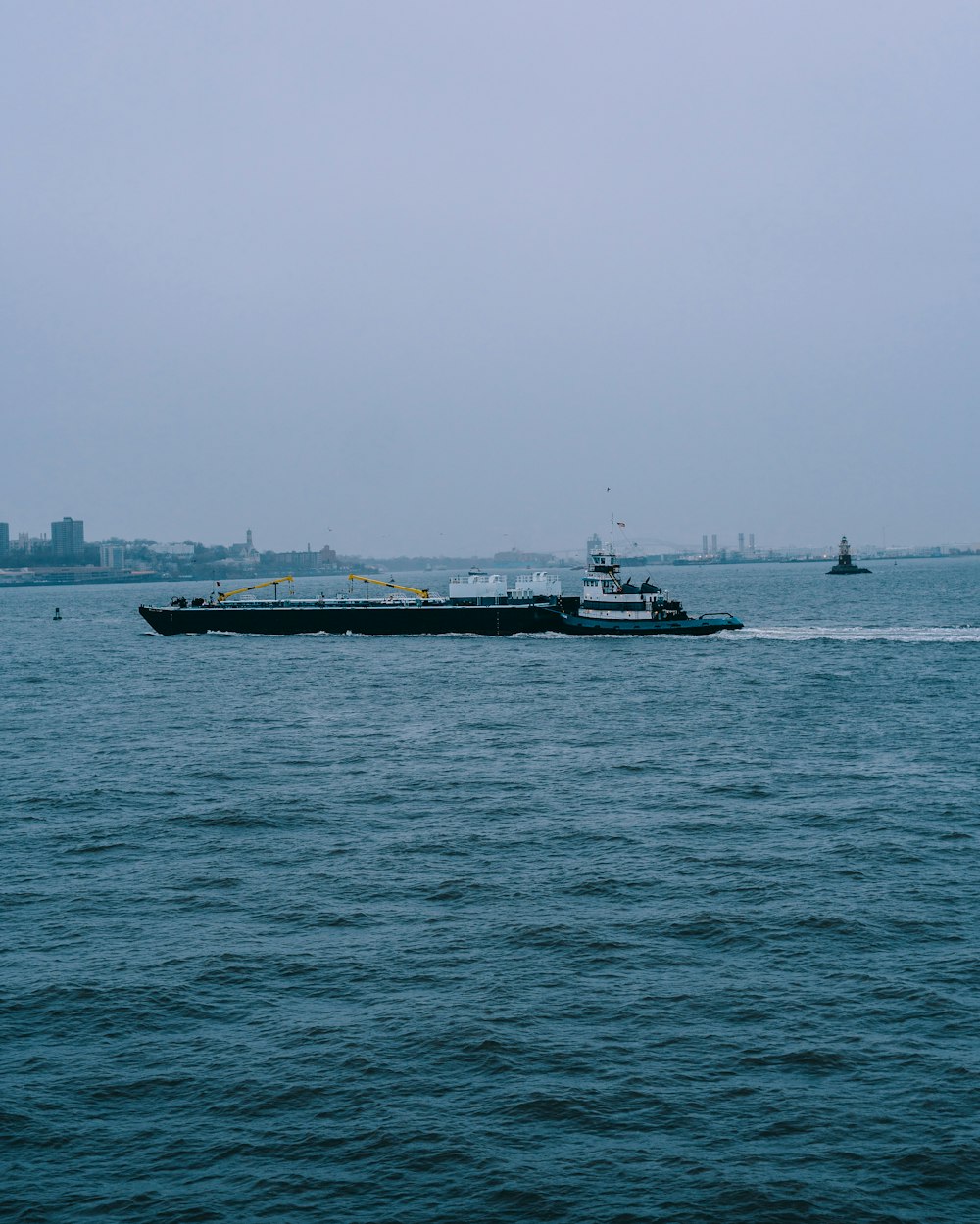 a large boat traveling across a large body of water