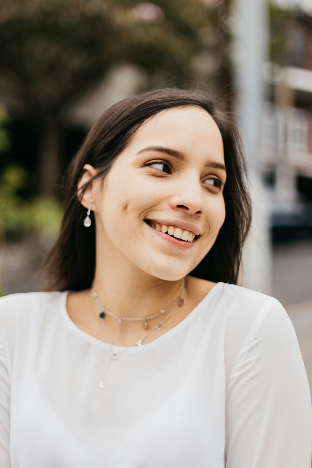 smiling woman facing side view