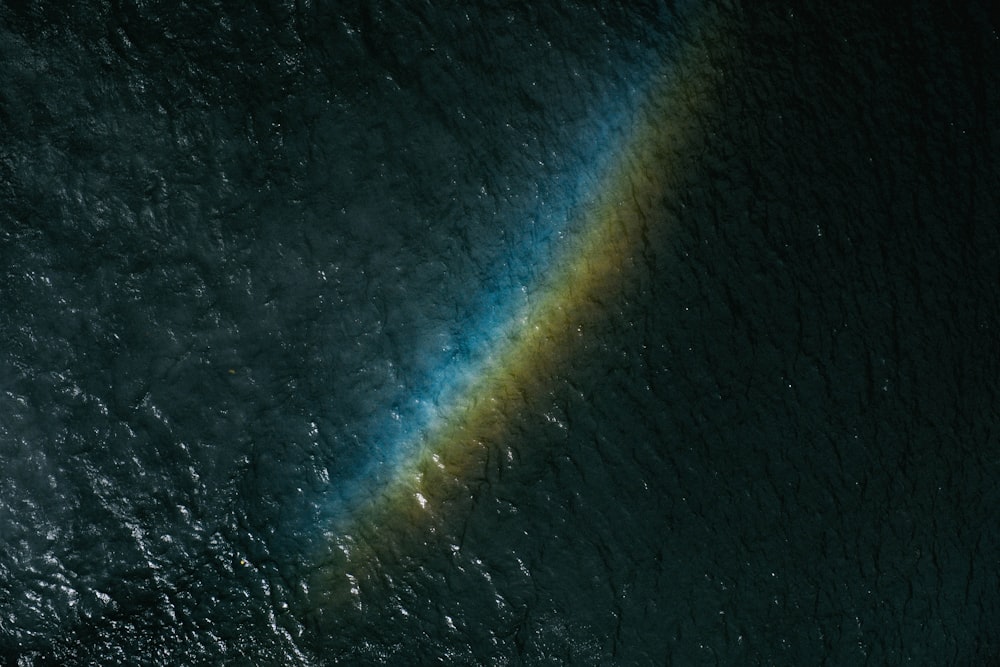 rainbow reflected on sea