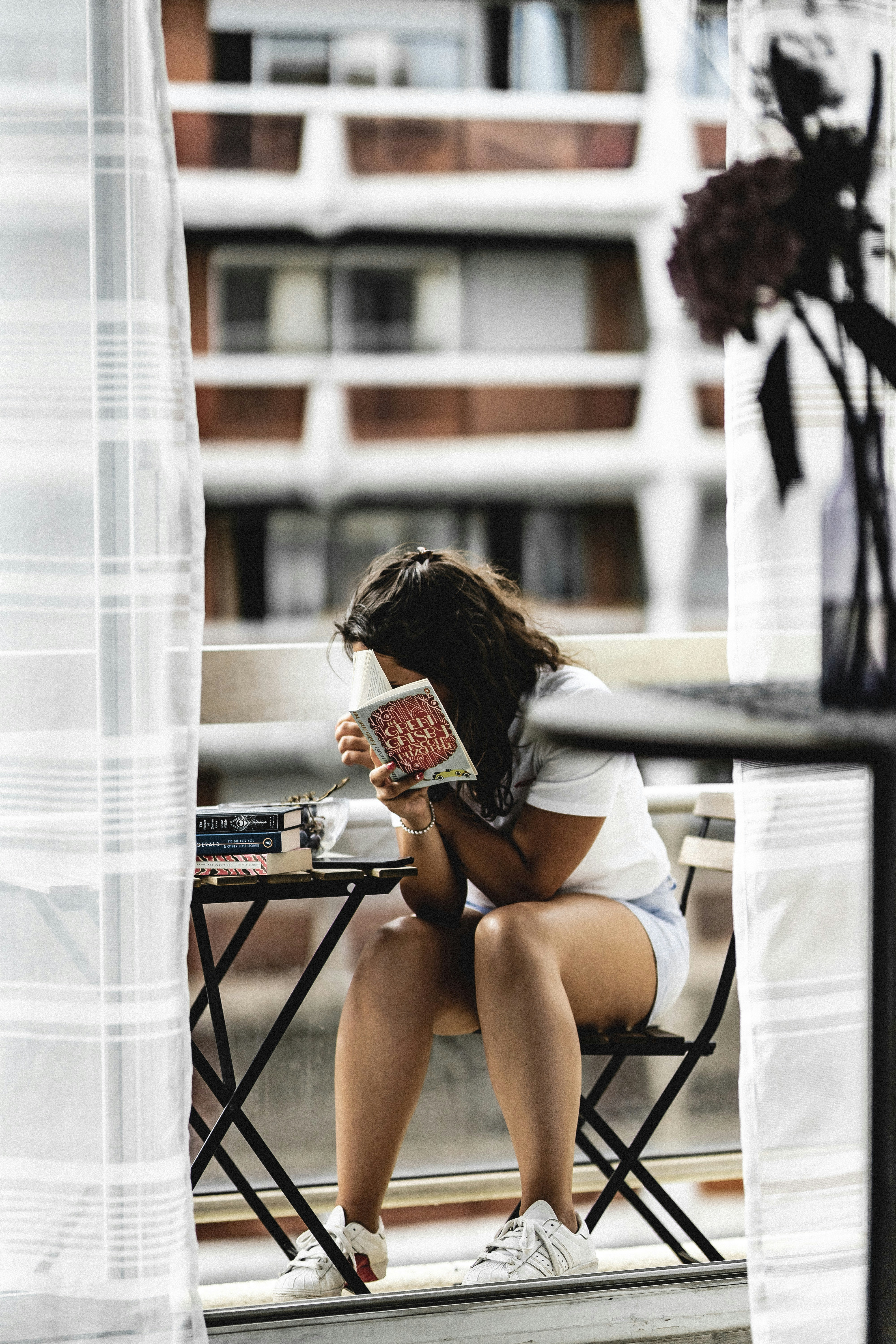 woman sitting on black chair