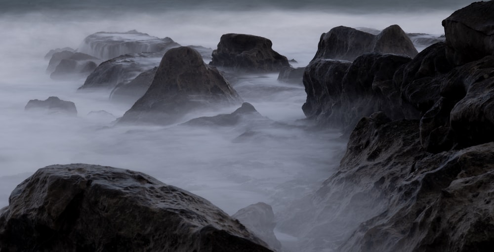 stone formations during foggy daytime