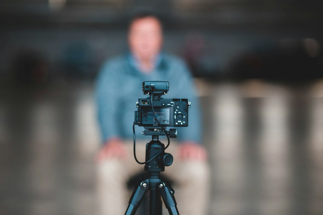 black camera on tripod,