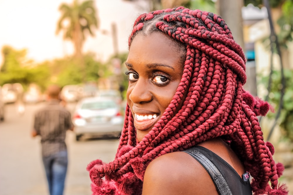 smiling woman with bokeh lights