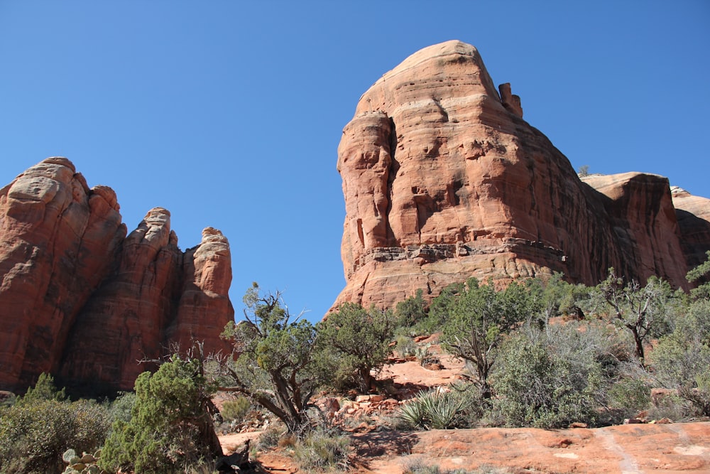 brown buttes in canyon at daytime