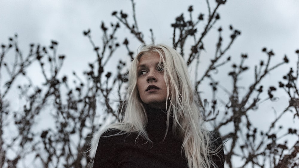 woman wearing black turtleneck sweater