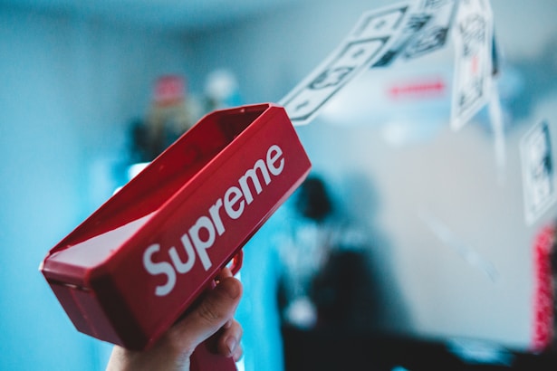 rectangular red Supreme money implying branding and also investment