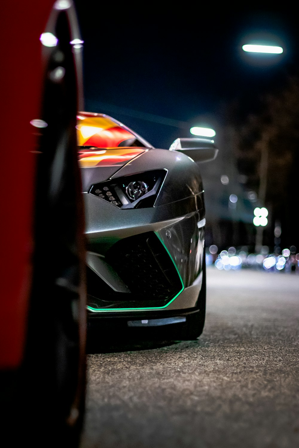 gray vehicle on road at night