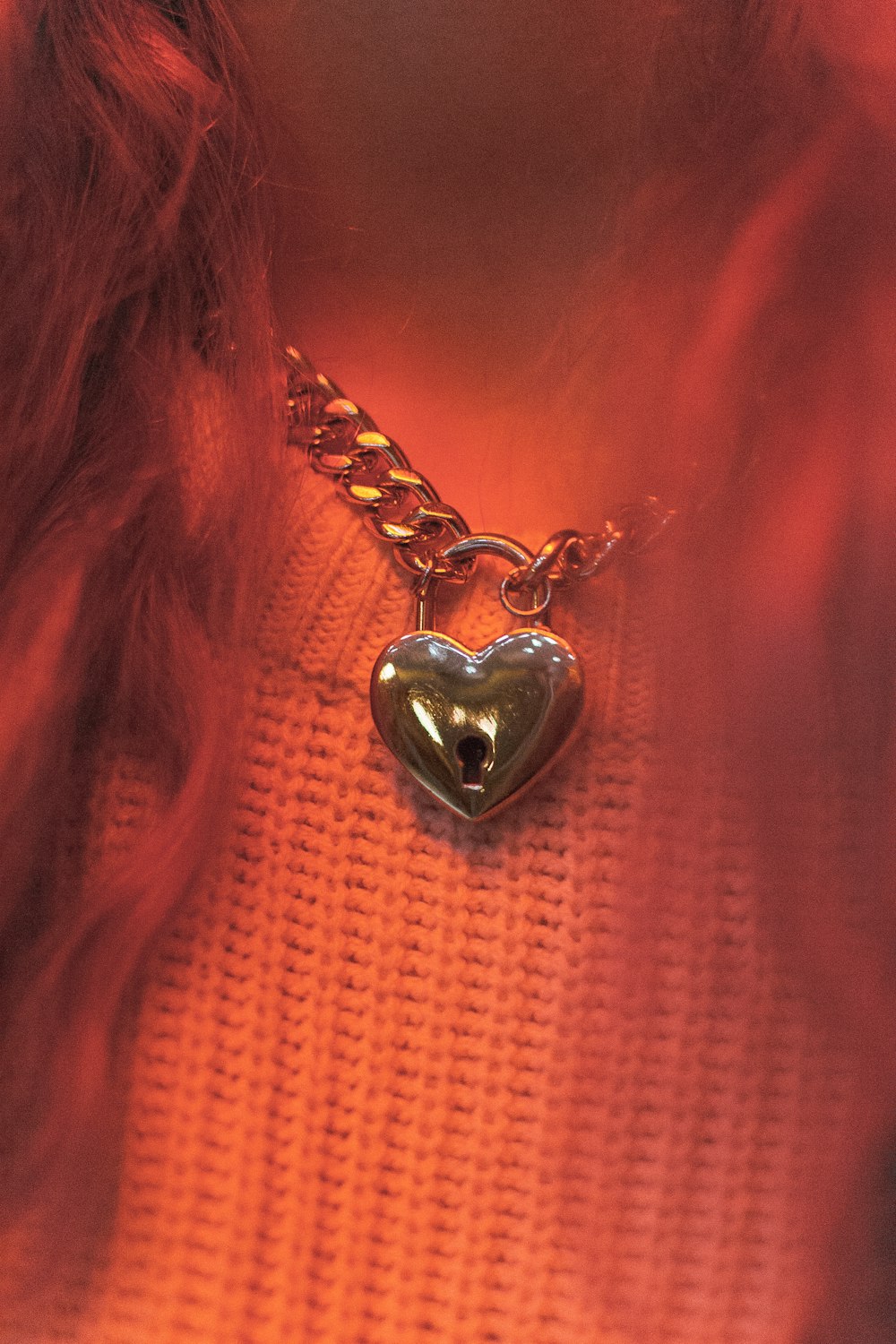 silver-colored heart pendant necklace