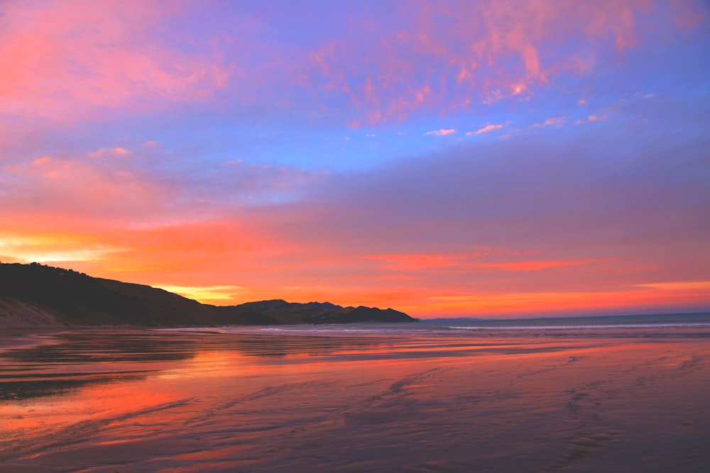 landscape photography of body of water