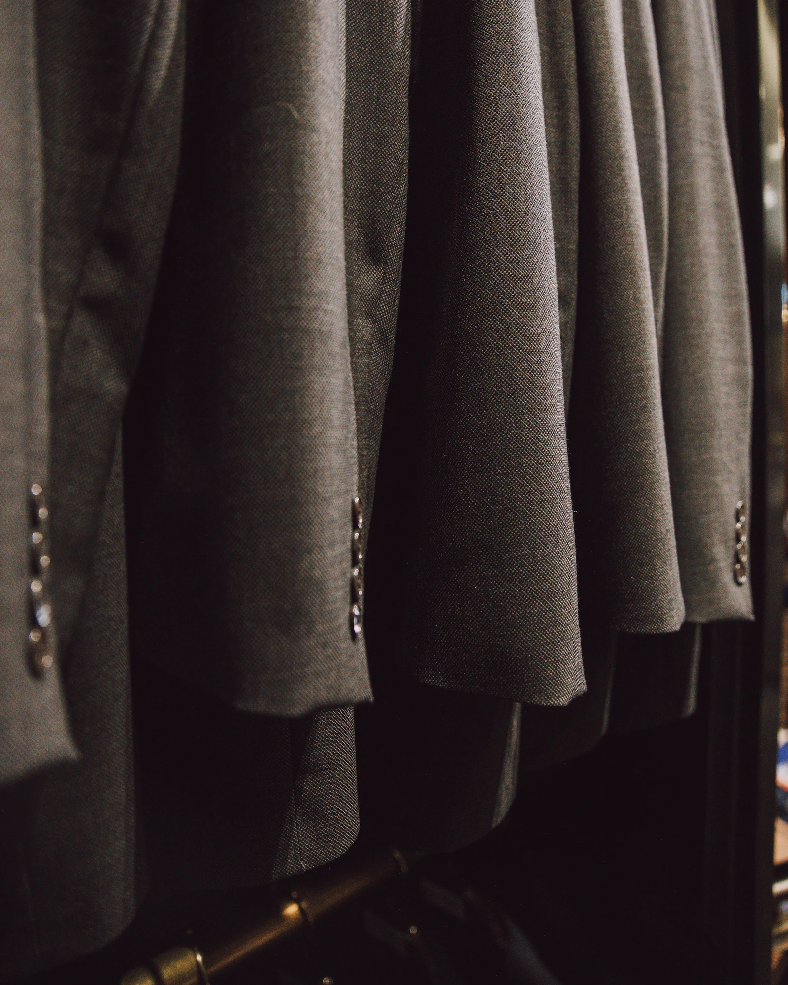 Finished garments on the delivery rail