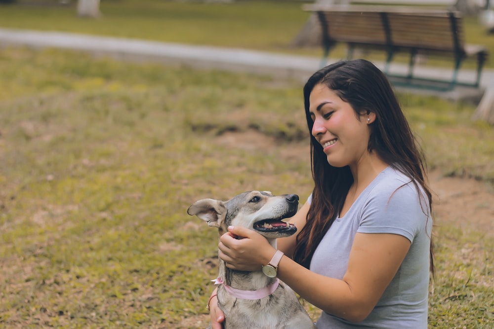 woman petting dog