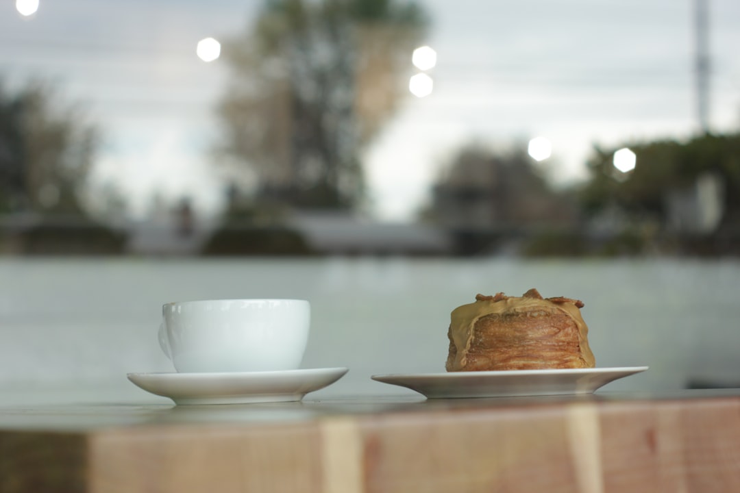 white ceramic teacup and saucer