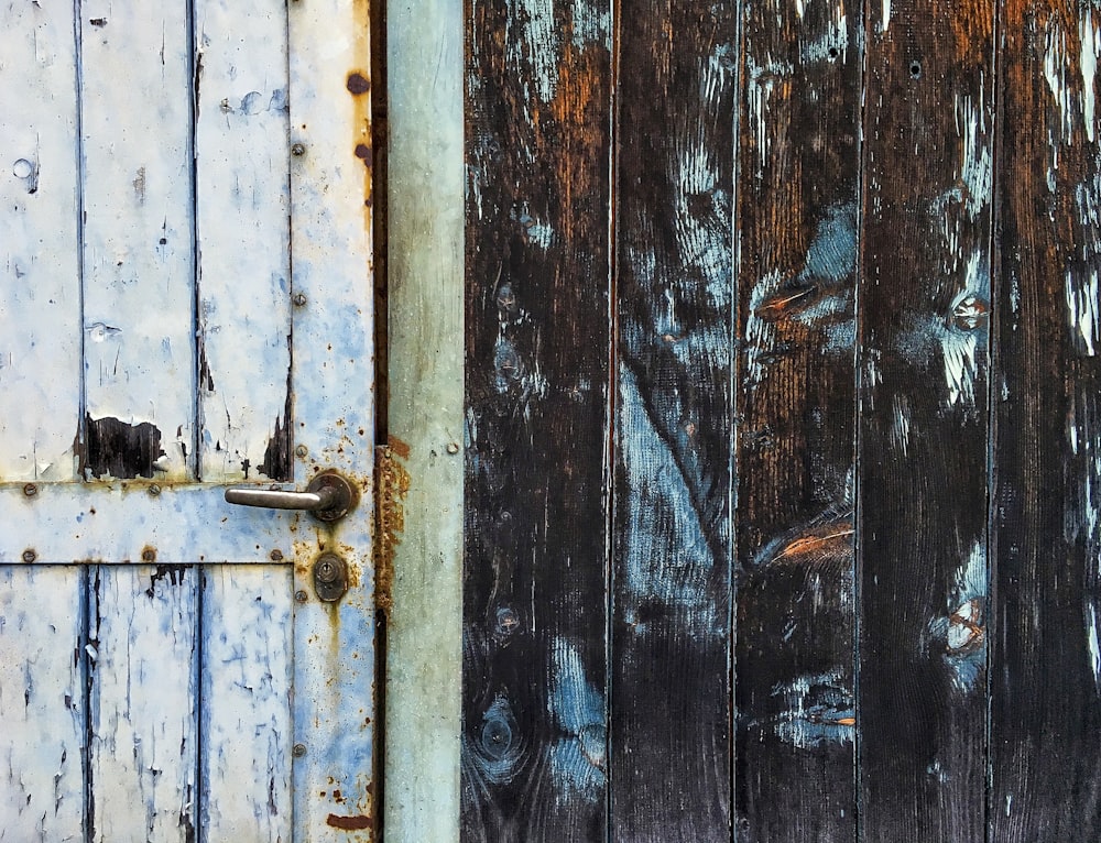 shallow focus photo of gray wooden door