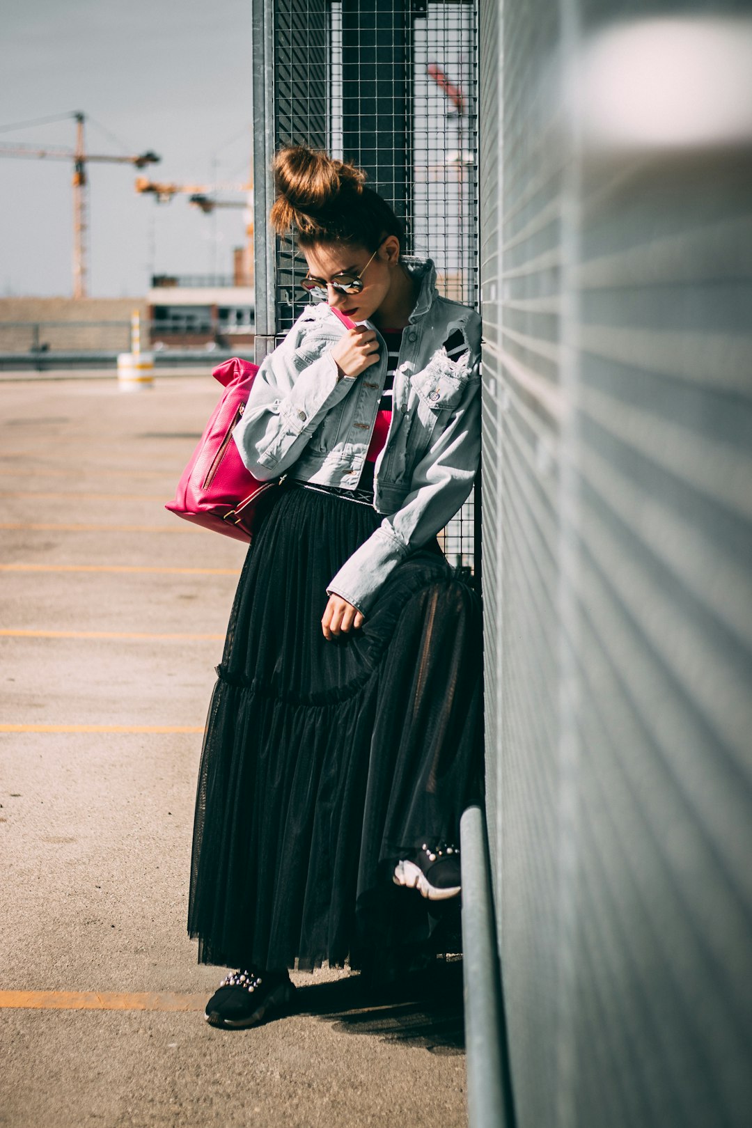 woman wearing blue denim jacket