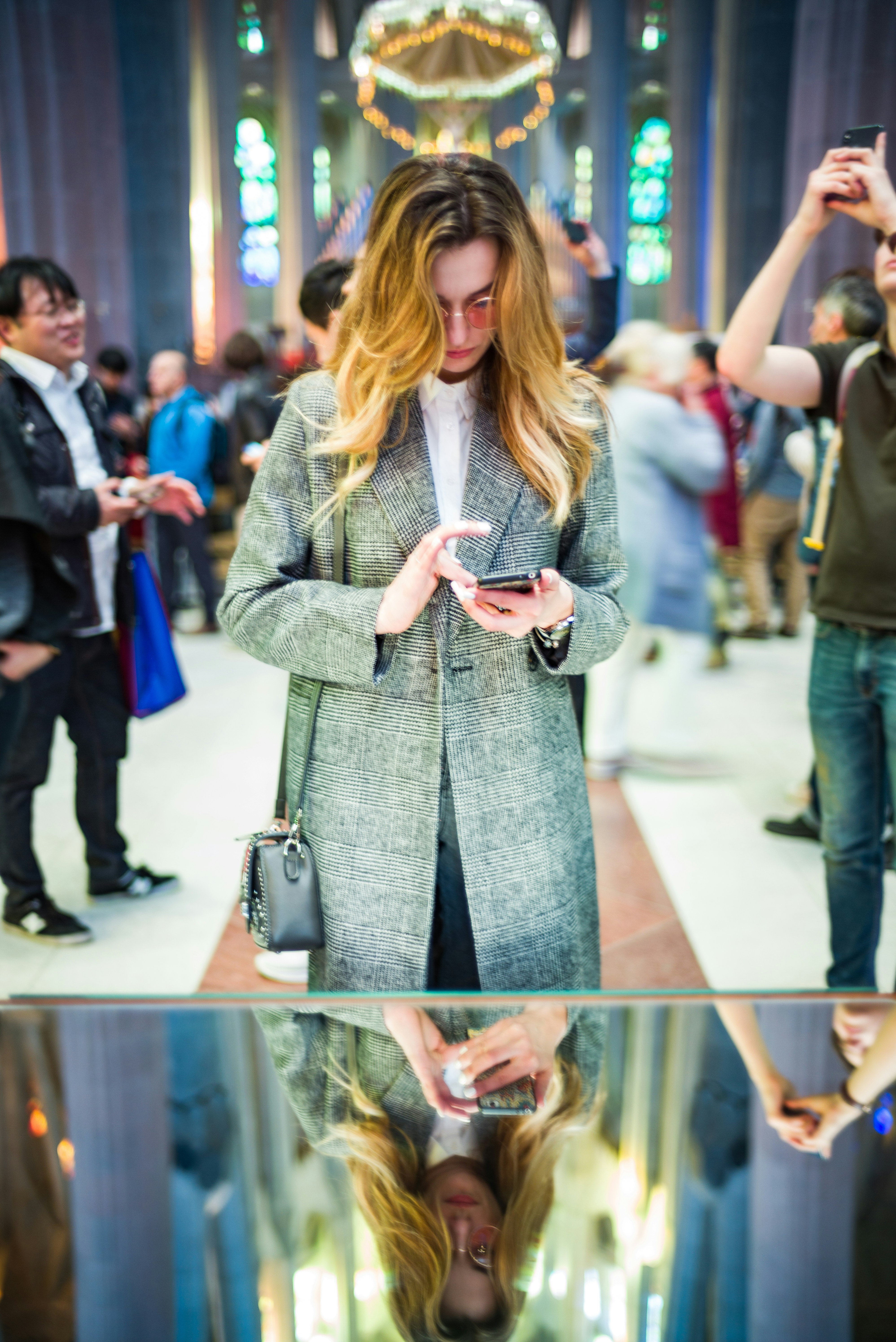 Woman happily using Evernow platform on her smartphone