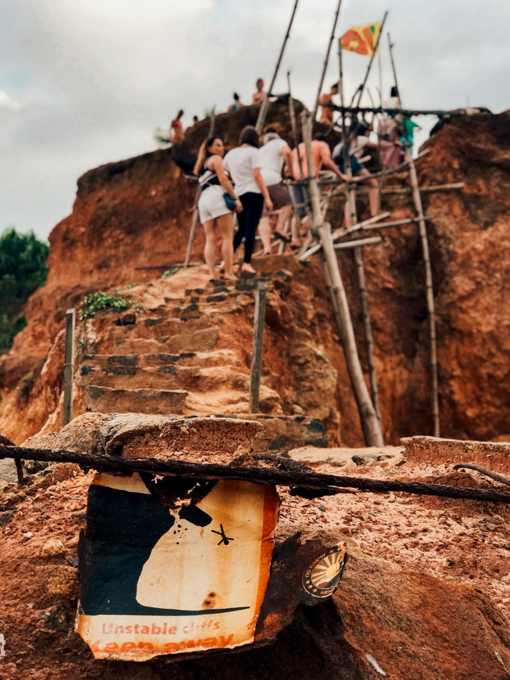 people walking on cliff during daytime