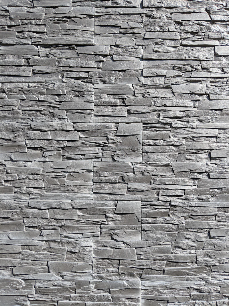 A modern gray stacked stone cladding panel.
