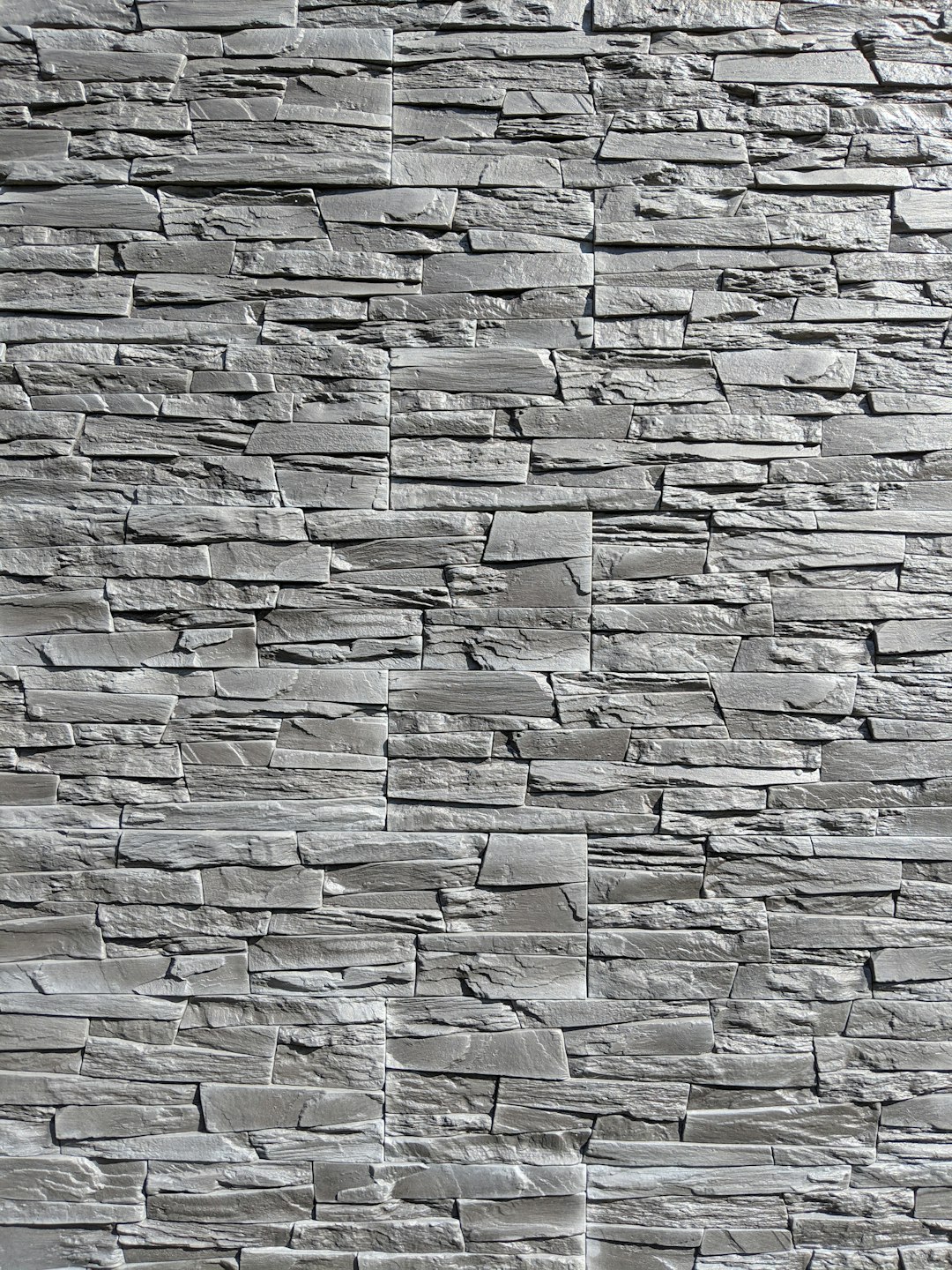  gray stone wall cladding wall